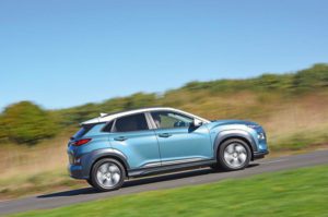 compare hyundai kona vs mg zs ev review which is better in performance range 0 to 100